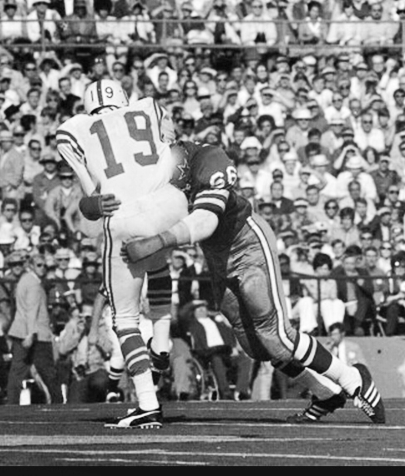 George Andrie of the Dallas Cowboys knocks Johnny Unitas of the Baltimore Colts out of the game in Super Bowl 5.